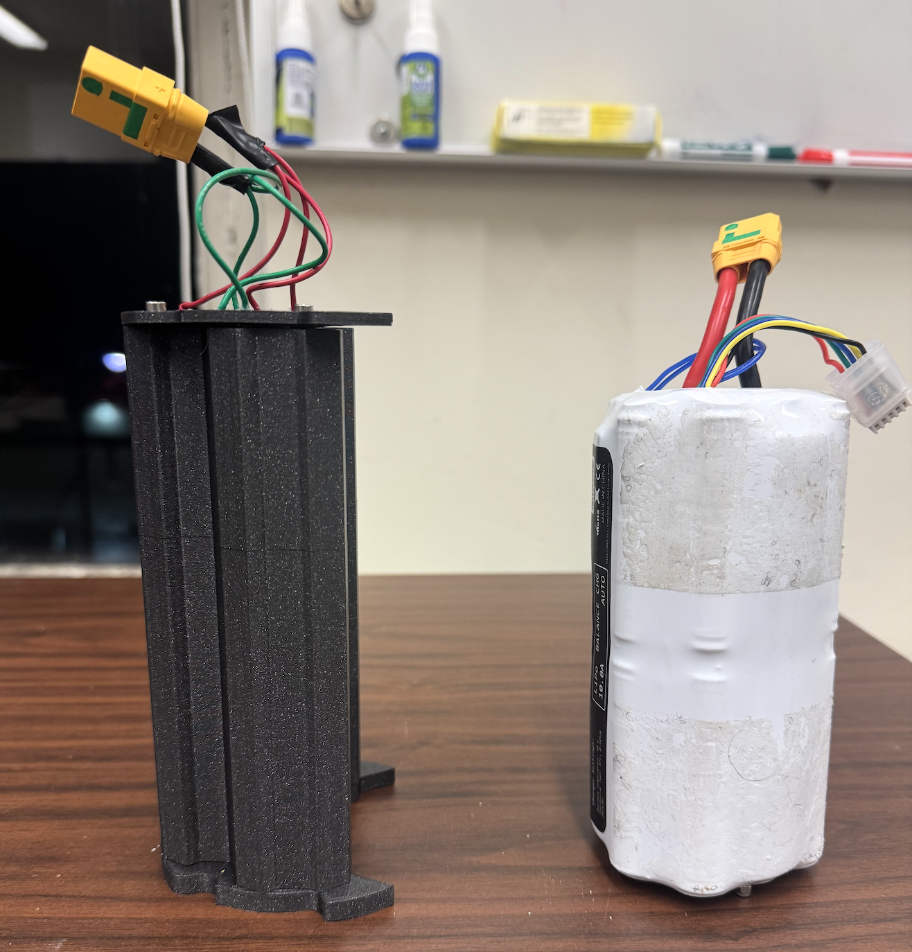 Battery pack prototype alongside BlueROV battery